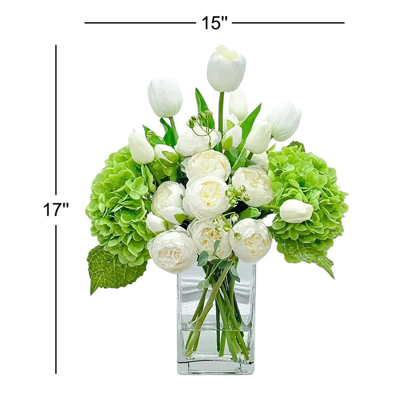 Arrangement floral mélangé dans un vase