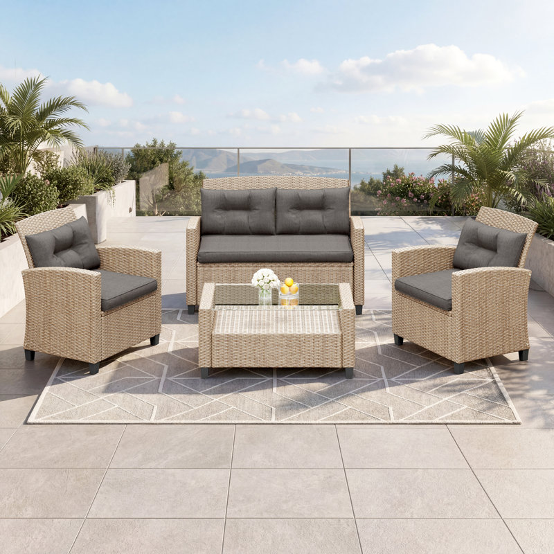 Jett 4 - Person  Wicker / Rattan Outdoor Sofa Seating Group with  Glass-Top Shelf-Storage Table & Cushions, Dark Gray