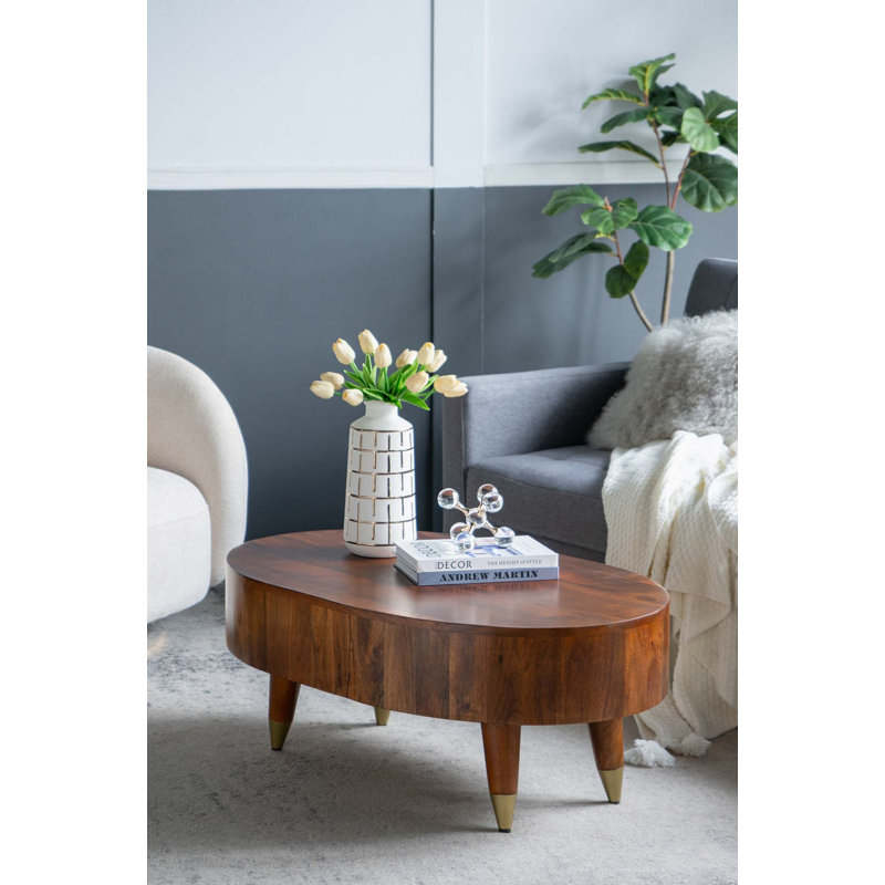 Table basse ovale en bois à quatre pieds