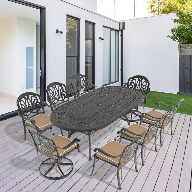 Ensemble de salle à manger 9 pièces en fonte d'aluminium toutes saisons comprenant 2 chaises pivotantes, 6 chaises et une table ovale avec cadre noir