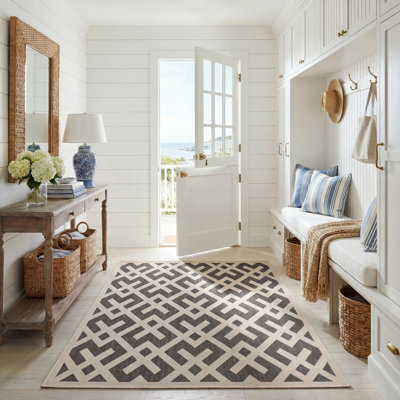 Tapis intérieur / extérieur noir / beige à motif géométrique Arneshia