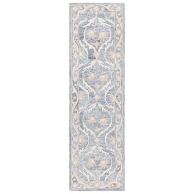 Bornie Tufted Wool/Cotton Damask Rug in Blue/Ivory