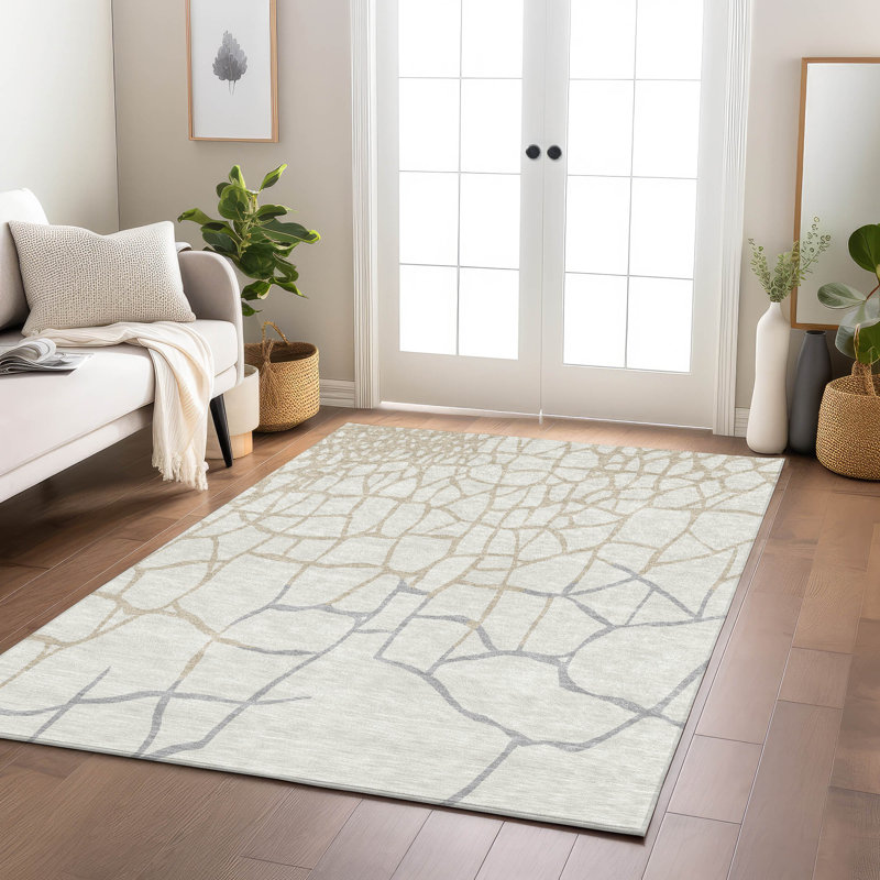 Ivory and Beige Flat Woven Synthetic Area Rug