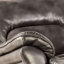 Fauteuil oscillant manuel Josy, accoudoirs coussinés, similicuir gris foncé