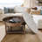 Large round ottoman coffee table in light grey, 2-tier design with button tufted top & wood storage shelf