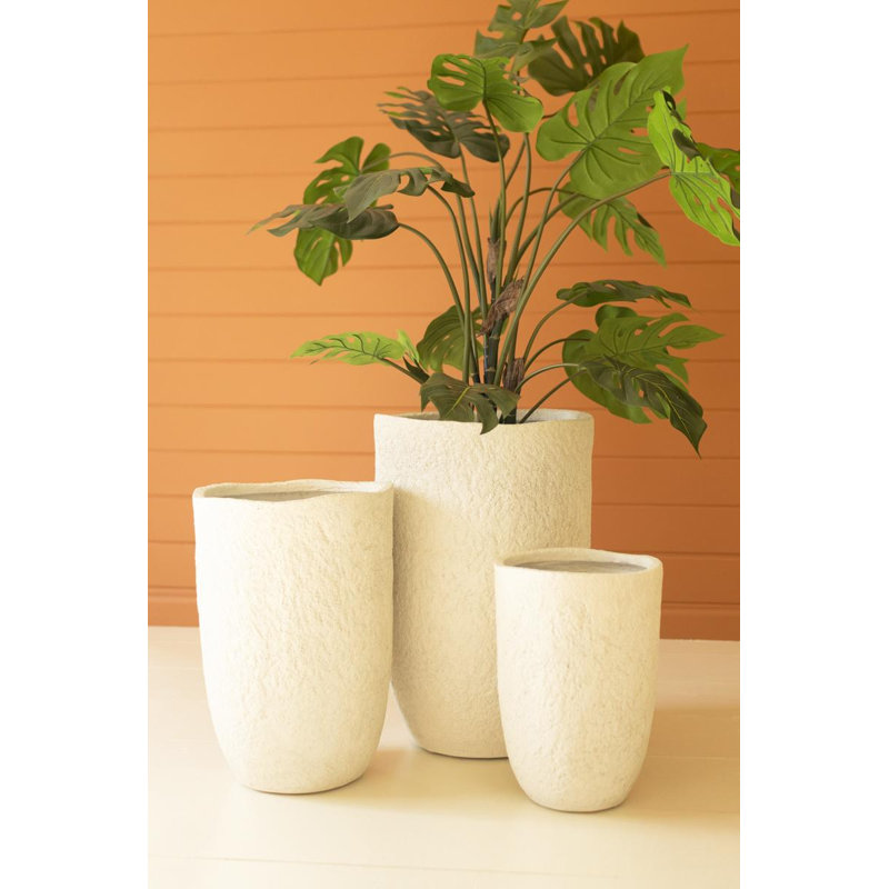 Ensemble de trois jardinières en pierre Kalalou
