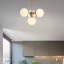 Lustre 4 lumières en métal avec capuchon en verre