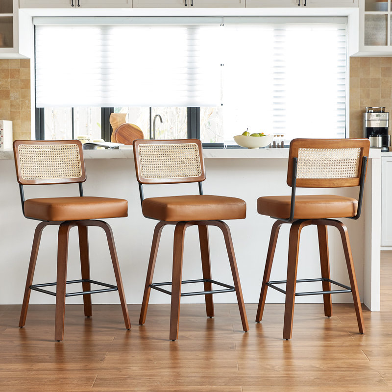 Swivel Counter Height Bar Stools Set of 3,Mid Century Modern Barstools with Rattan Back,27 inch Seat Height Solid Wood Kitchen Island Stools,Brown Faux Leather Upholstery Bar Chairs