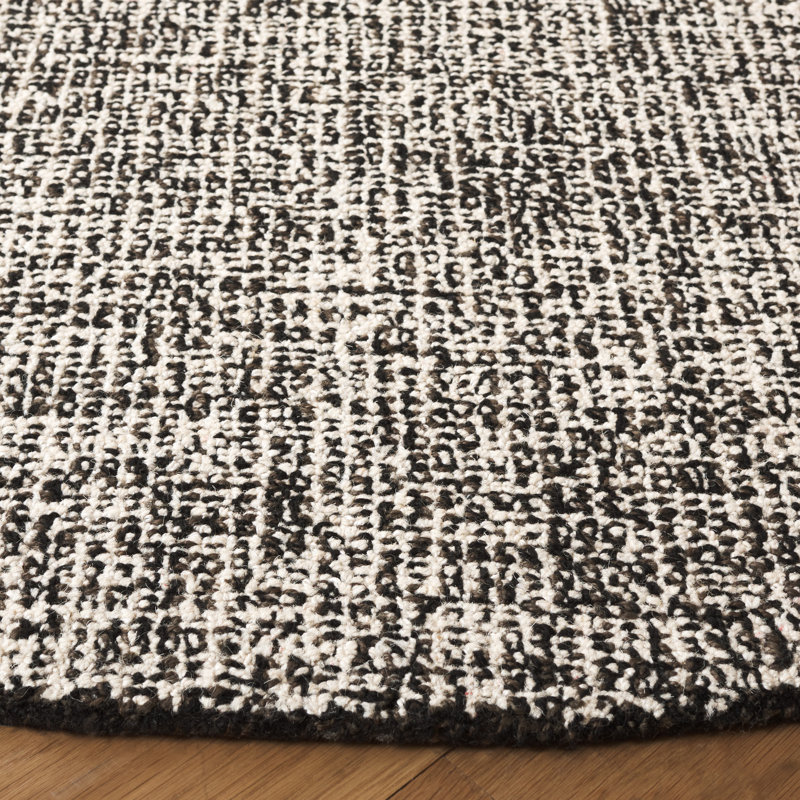 Macguiness Ebony Hand Tufted Wool Jute Cotton Rug in Black/Ivory, Round 6'