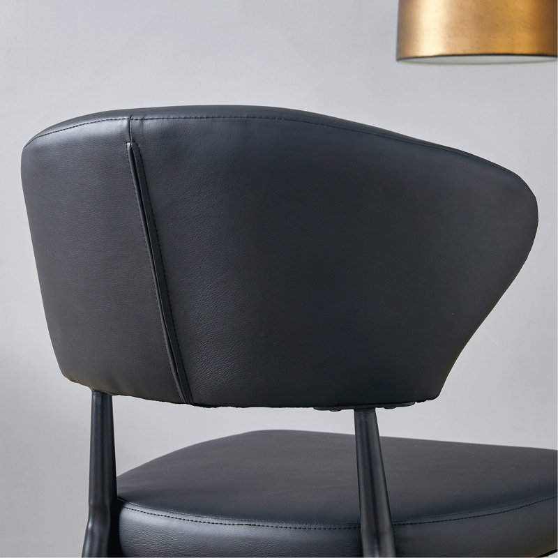 La chaise de salle à manger minimaliste et ergonomique, avec un dossier incurvé pour une conception confortable, libère une nouvelle position assise confortable et minimaliste. Un paquet de 4.