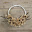 Couronne à raser en bois avec plumes
