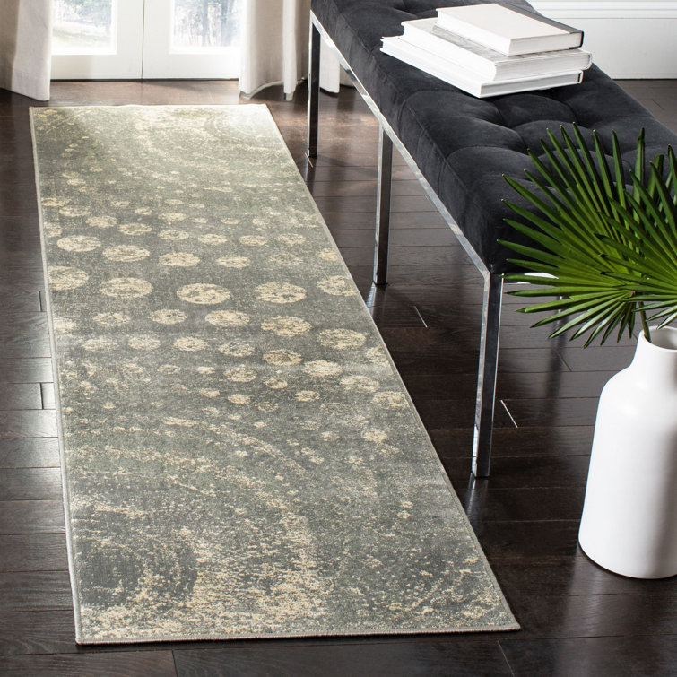Tapis abstrait gris clair doré