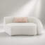 Canapé modulaire beige avec 3 coussins et base en acier inoxydable