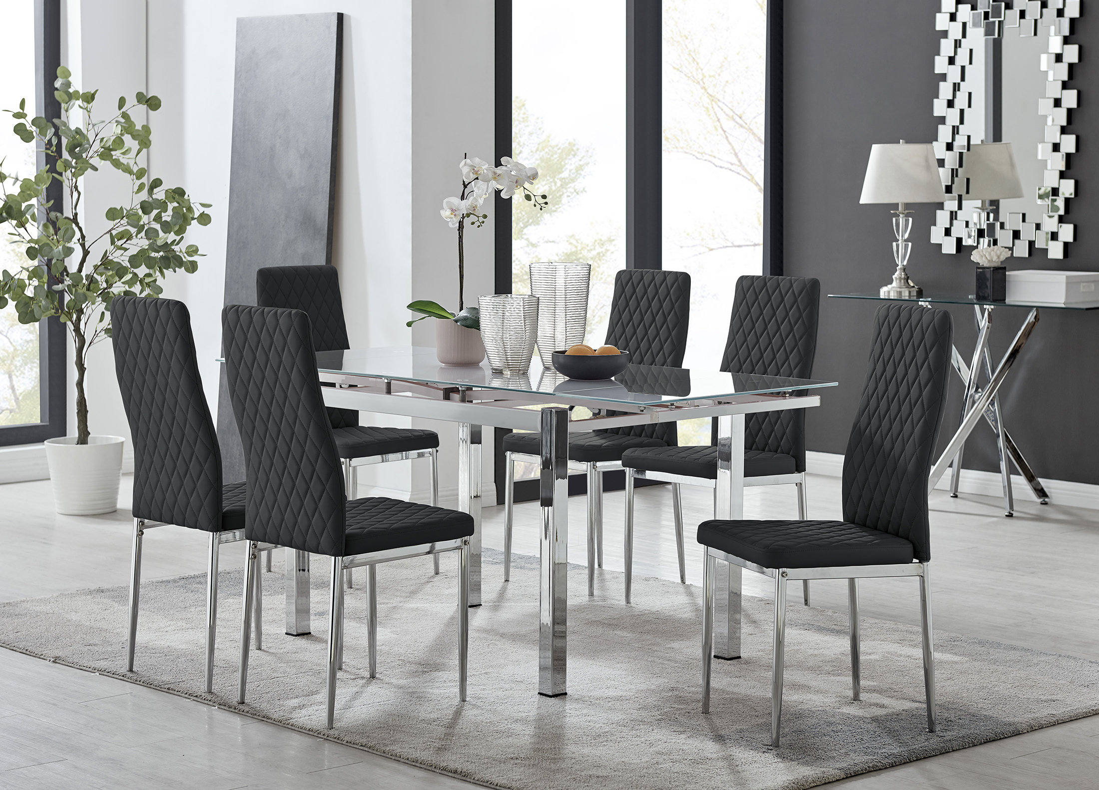 East Urban Home Tierra Modern Glass Metal Extendable Dining Table Set 6 Luxury Faux Leather Dining Chairs Reviews Wayfair