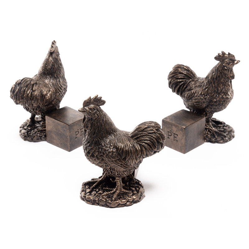 Pieds de jardinière couleur poulet en bronze dans une boîte cadeau
