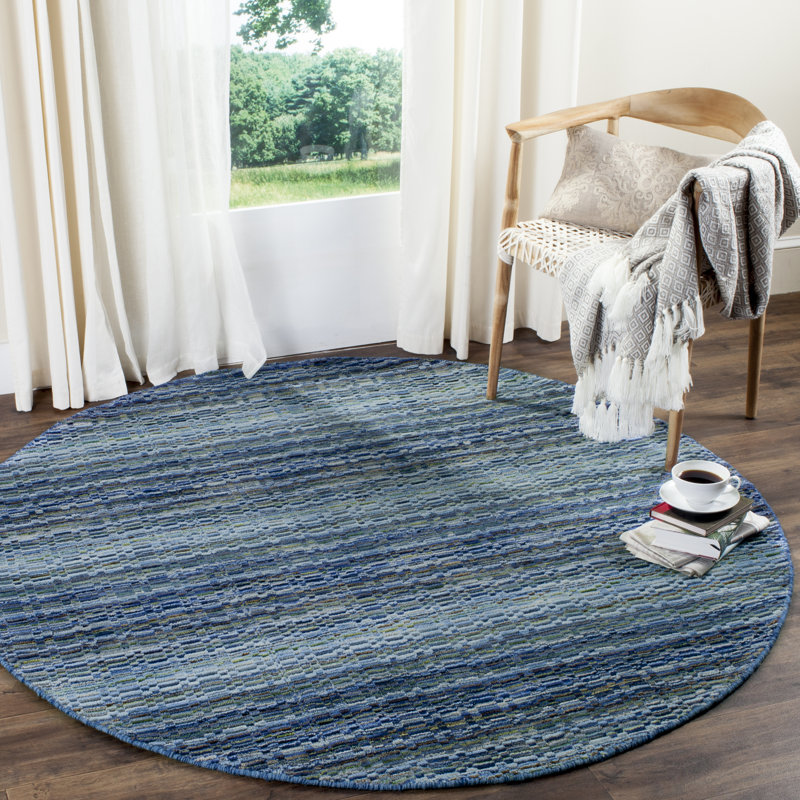Hossain Hand Loomed Wool Abstract Rug, Round 6'