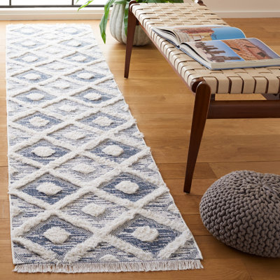 Tapis géométrique bleu marine / ivoire Tignall