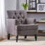 Fauteuil club capitonné