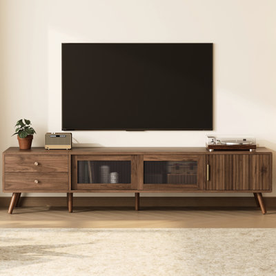 Meuble télé 85 po, design minimaliste moderne 76 po avec portes en verre Waveform, console média grain de bois dans le salon, tiroirs et charnières à fermeture douce