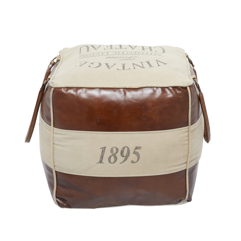 Pouf rembourré en toile brun avec détails en cuir