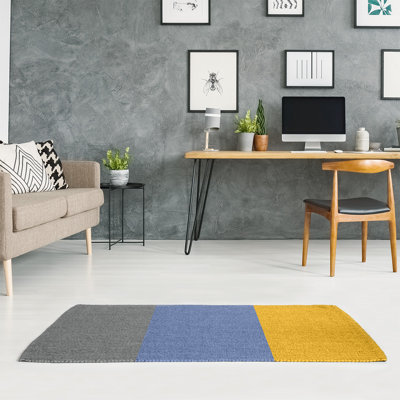 Tapis gris/bleu/jaune rayé