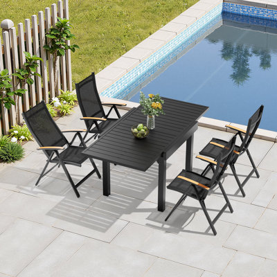 Ensemble de salle à manger pour 4 personnes en aluminium avec table extensible et fauteuils inclinables pliés