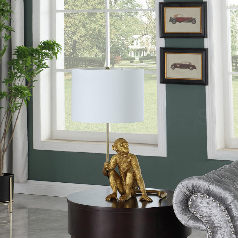 Lampe de table 25,50 "en singe doré tenant une polyrésine