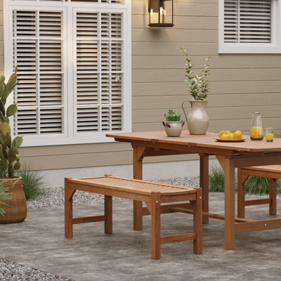 Natural Solid Wood 47.2-Inch Long Rectangle Sloping Seat Outdoor Bench by Loon Peak