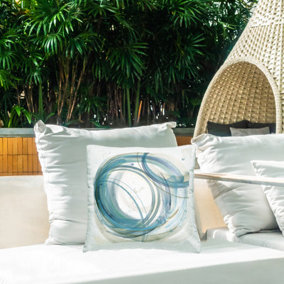 Coussin d'extérieur rond à formes superposées, design par Nan