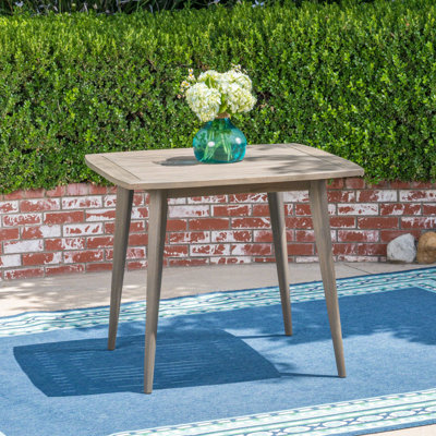 Table carrée pour l'extérieur - Bois gris avec pieds droits pour des activités durables