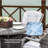Guyer 4 - Person Wicker Patio Dining Set with Round Table , Cushions Included-1144886323-1110146180