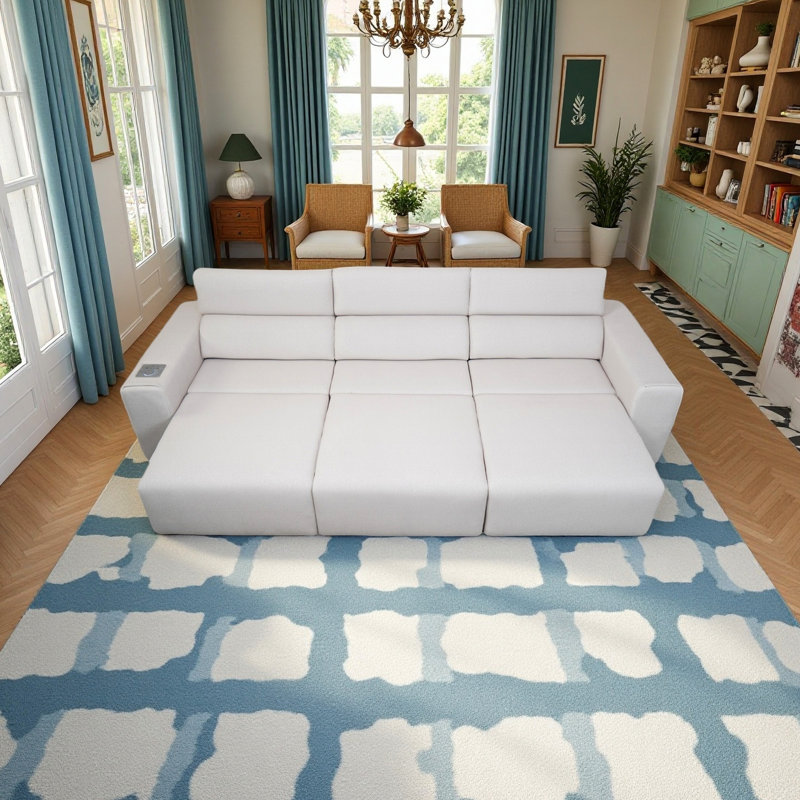 Siège inclinable électrique à 3 places avec stéréo, recharge sans fil et poche latérale. Profondeur personnalisable, modes de contrôle doubles, éclairage d'ambiance. Parfait pour faire la sieste dans le cinéma maison