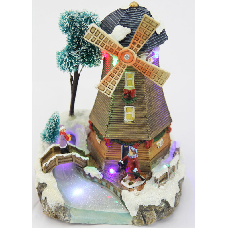 Maison de moulin à vent éclairée