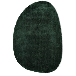 Handmade Cozy rug in dark green