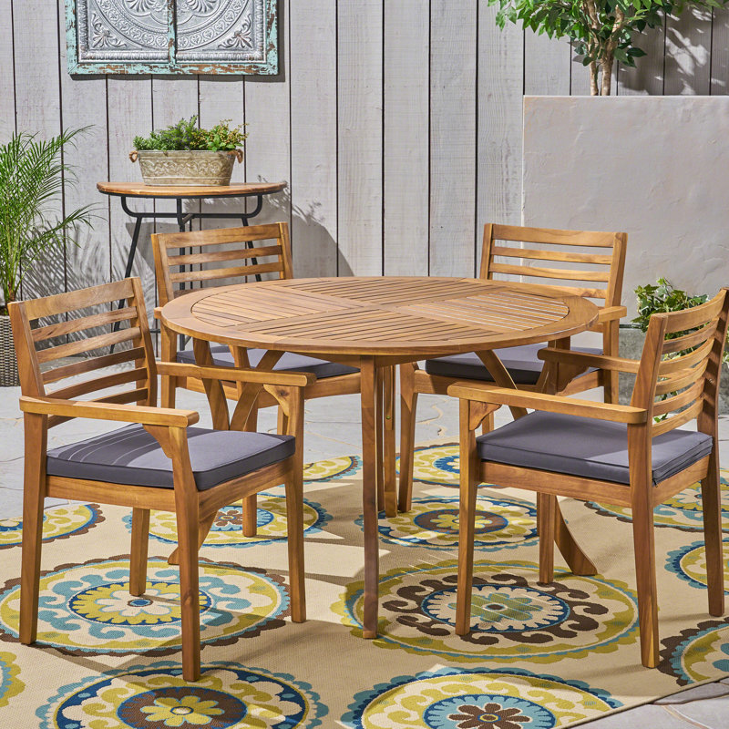Tinnin 4 - Person Wood Patio Dining Set with Round Table , Cushions Included, Teak