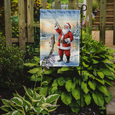 Pêche au père Noël avec truite arc-en-ciel, drapeau du jardin de Noël