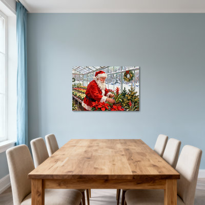 Christmas Santa Tending Poinsettias In Greenhouse