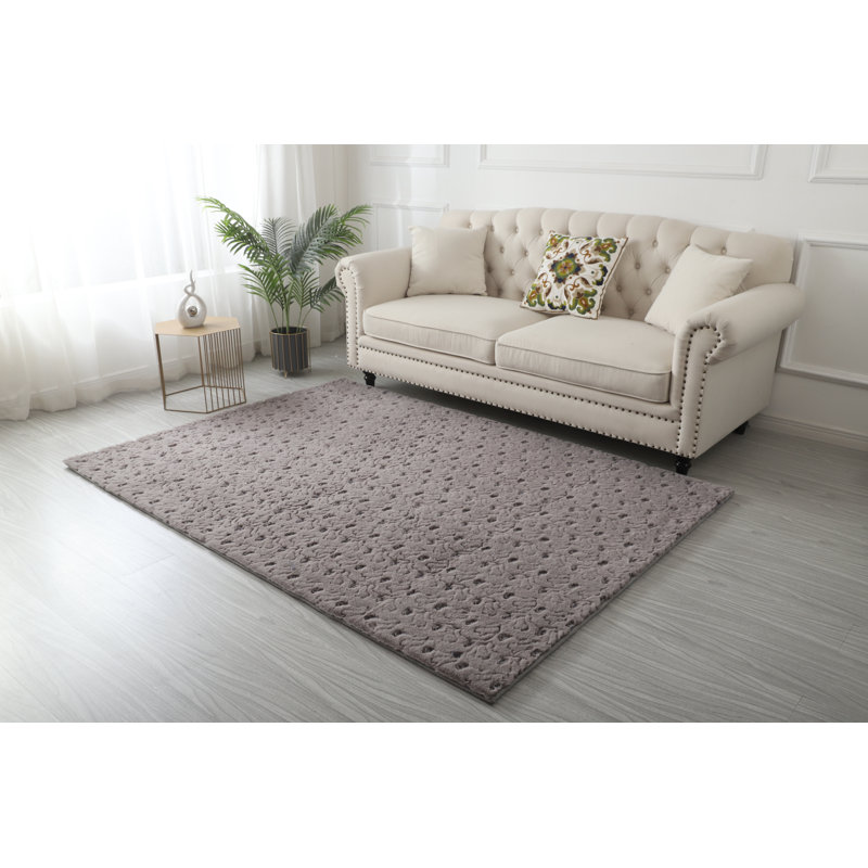 Tapis gris abstrait à poils longs