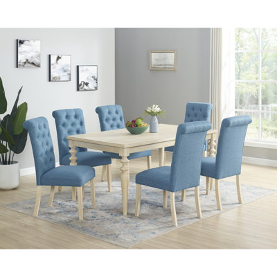 Ensemble de salle à manger Amonia, table de salle à manger à pieds tournés avec chaises capitonnées