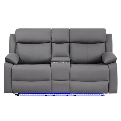 Fauteuil inclinable gris avec éclairage DEL, haut-parleurs et console, mécanisme d'inclinaison manuel, deux porte-gobelets intégrés dans les accoudoirs rembourrés pour un confort optimal, siège semi-ferme et système audio intégré.