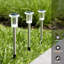 Éclairage de sentier solaire pour l'extérieur, paquet de 4 de 13 pouces, piquets solaires à lentille de cristal avec motif en étoile, lumières de jardin imperméables Ip65 pour paysage de patio