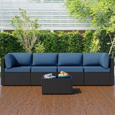 Seville 4 - Person Outdoor Wicker Patio Set with Cushions