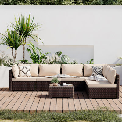 Forksville 7 Piece Rattan Sectional Seating Group with Cushions by Wade Logan