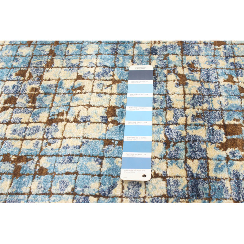 Tapis décoratif bleu/crème de conception unique 8 pi x 10 pi noué à la main New Age