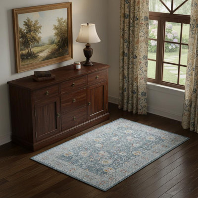 4' X 6' Blue And Ivory Floral Area Rug With UV Protection
