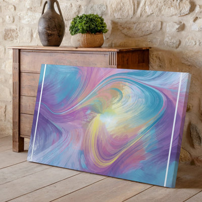 Toile d'un fond abstrait tourbillonnant et vibrant avec des couleurs pastel douces, y compris l'art mural, roses, bleus jaunes et verts, mélange d'art sur toile
