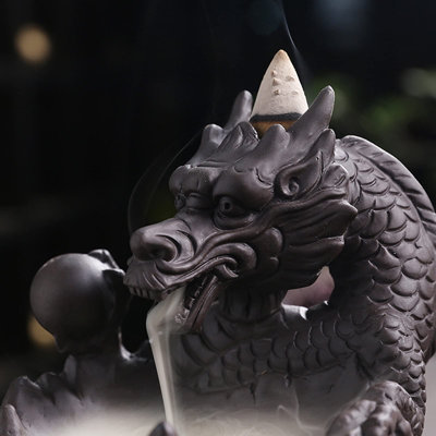Porte-encens dragon, cascade de crânes