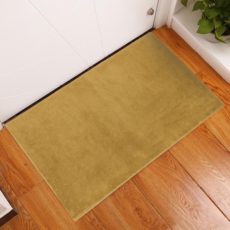 Spiceland Floral Polypropylene Area Rug in Solid Beige