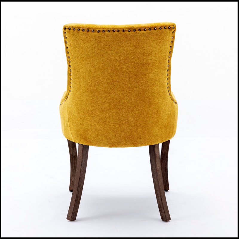 Chaise d'appoint avec tissu épais et dossier haut pour une assise confortable dans les espaces de salle à manger modernes