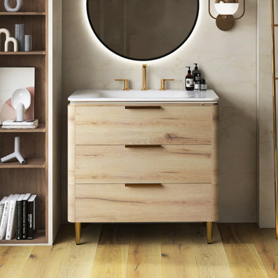 Meuble-lavabo autoportant pré-assemblé à rebords courbés en contreplaqué avec lavabo, 3 tiroirs et lavabo intégré en pierre frittée blanche de Carrare, couleur grain de bois chêne blanc